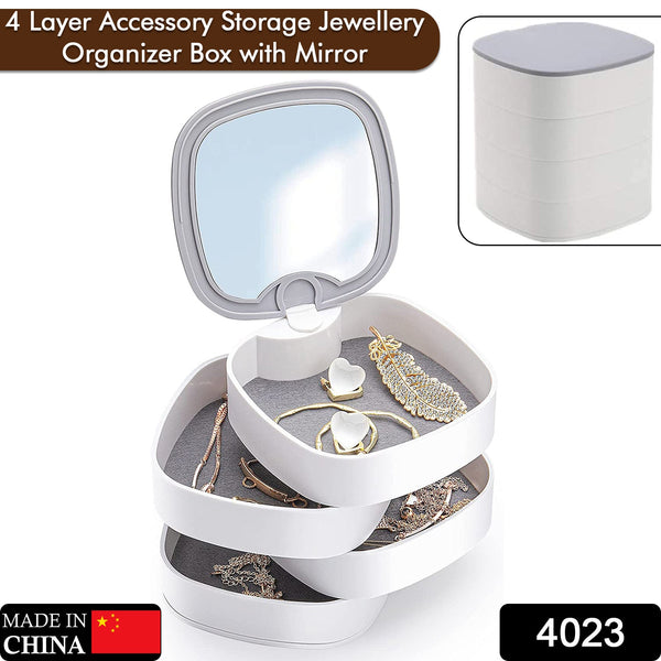 Close-up of rotating jewelry box with mirror and multicolor layers