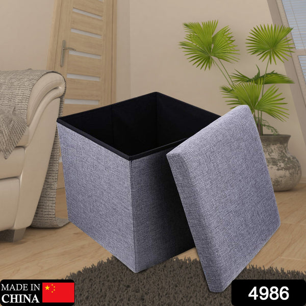 Foldable storage bin with cushion seat