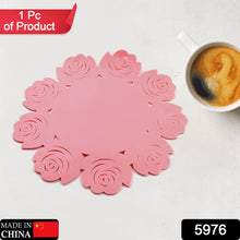 Circular placemat in rose color for plate and cup use