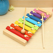 Xylophone set arranged with colorful bars and mallet for play