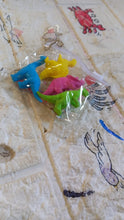 Set of dinosaur erasers for children’s school supplies